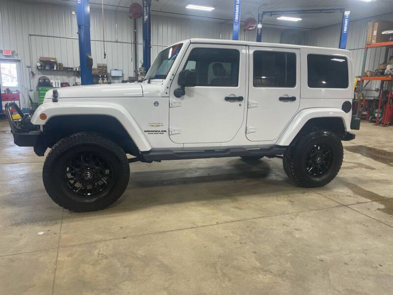 2012 Jeep Wrangler Unlimited for sale at Southwest Sales and Service in Redwood Falls MN