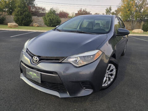 2015 Toyota Corolla for sale at Austin Auto Planet LLC in Austin TX