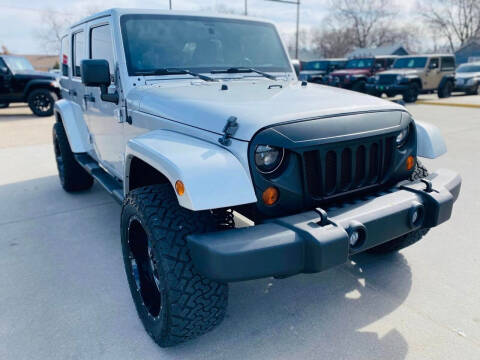 2012 Jeep Wrangler Unlimited for sale at Island Auto in Grand Island NE
