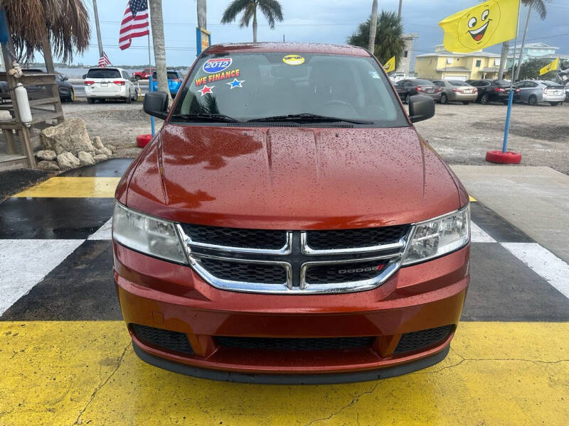 Used 2012 Dodge Journey SE with VIN 3C4PDCAB7CT276073 for sale in Melbourne, FL