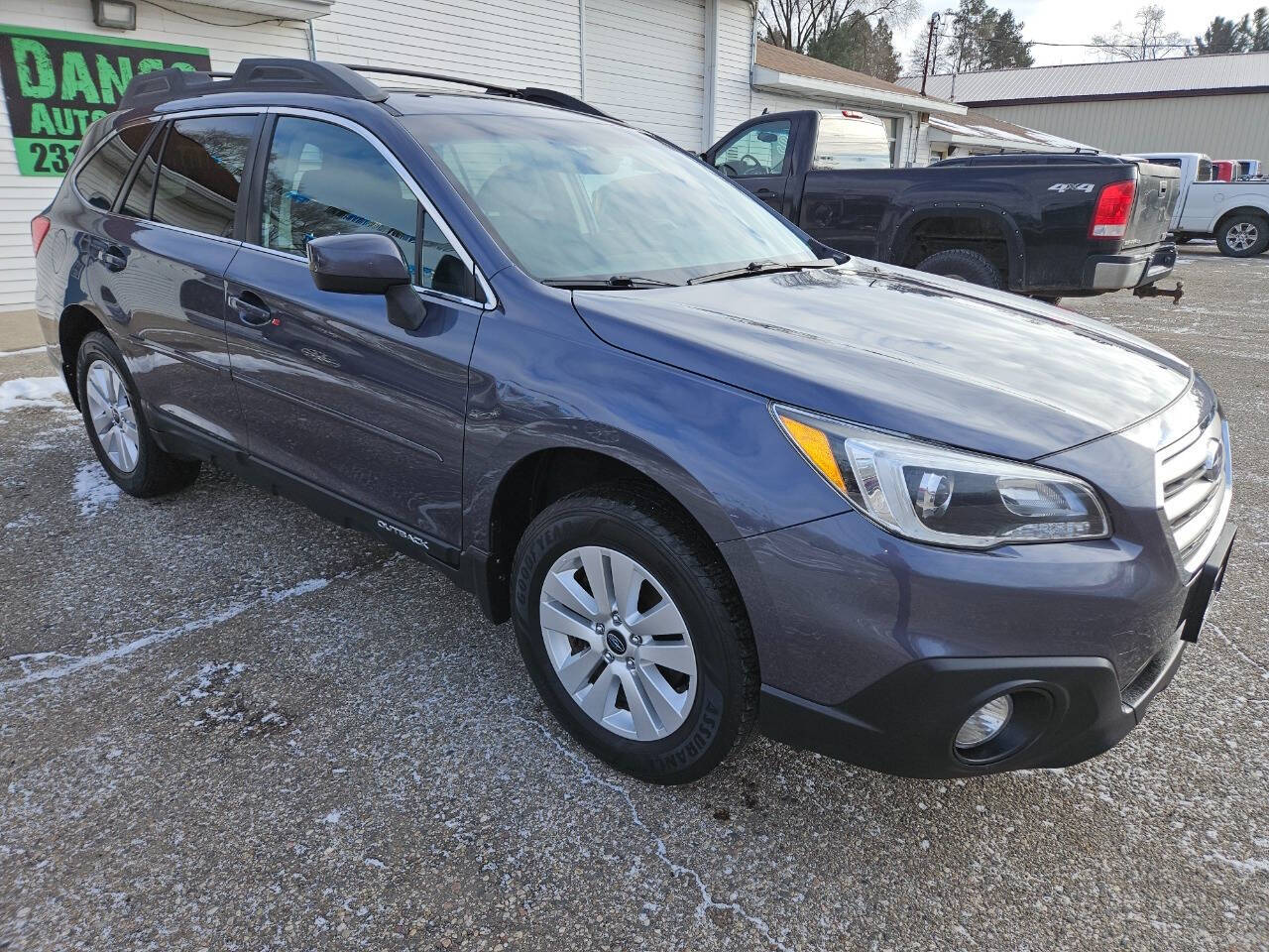 2017 Subaru Outback for sale at DANGO AUTO SALES in HOWARD CITY, MI