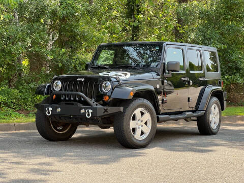 2011 Jeep Wrangler Unlimited for sale at H and S Auto Group in Canton GA