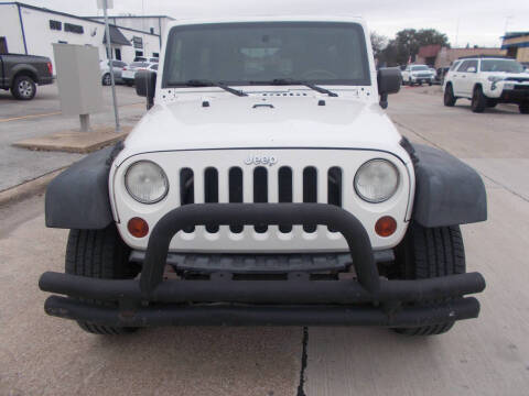 2009 Jeep Wrangler Unlimited for sale at ACH AutoHaus in Dallas TX