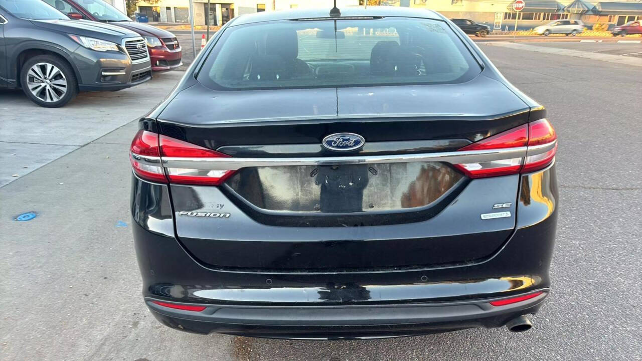 2018 Ford Fusion for sale at Ganda Auto Sales in Denver, CO