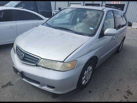 2004 Honda Odyssey for sale at FREDY CARS FOR LESS in Houston TX
