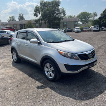 2012 Kia Sportage for sale at American & Import Automotive in Cheektowaga NY