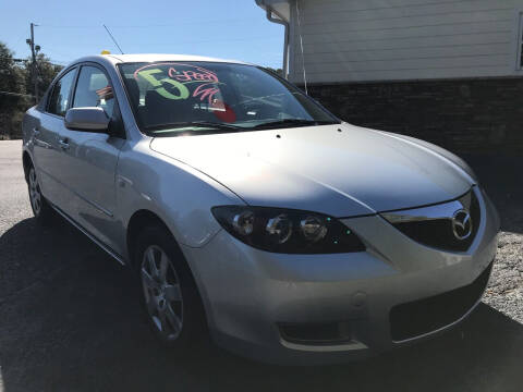 2009 Mazda MAZDA3 for sale at NO FULL COVERAGE AUTO SALES LLC in Austell GA