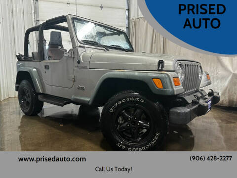 2000 Jeep Wrangler for sale at PRISED AUTO in Gladstone MI