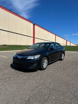2014 Toyota Camry for sale at Prime Auto Sales in Rogers MN