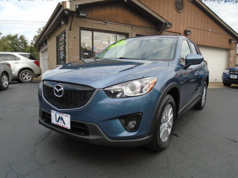 2015 Mazda CX-5 for sale at IBARRA MOTORS INC in Berwyn IL