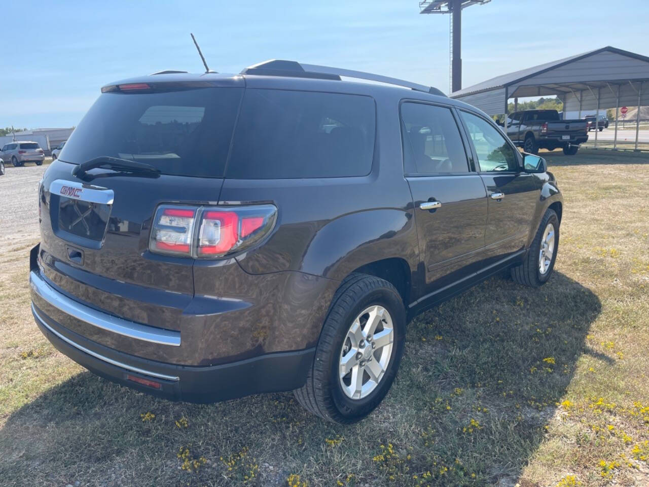 2015 GMC Acadia for sale at Madco Auto Sales in Bryant, AR