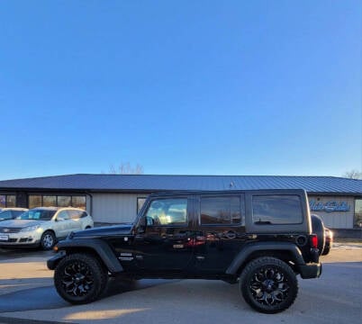 2014 Jeep Wrangler Unlimited for sale at ROSSTEN AUTO SALES in Grand Forks ND