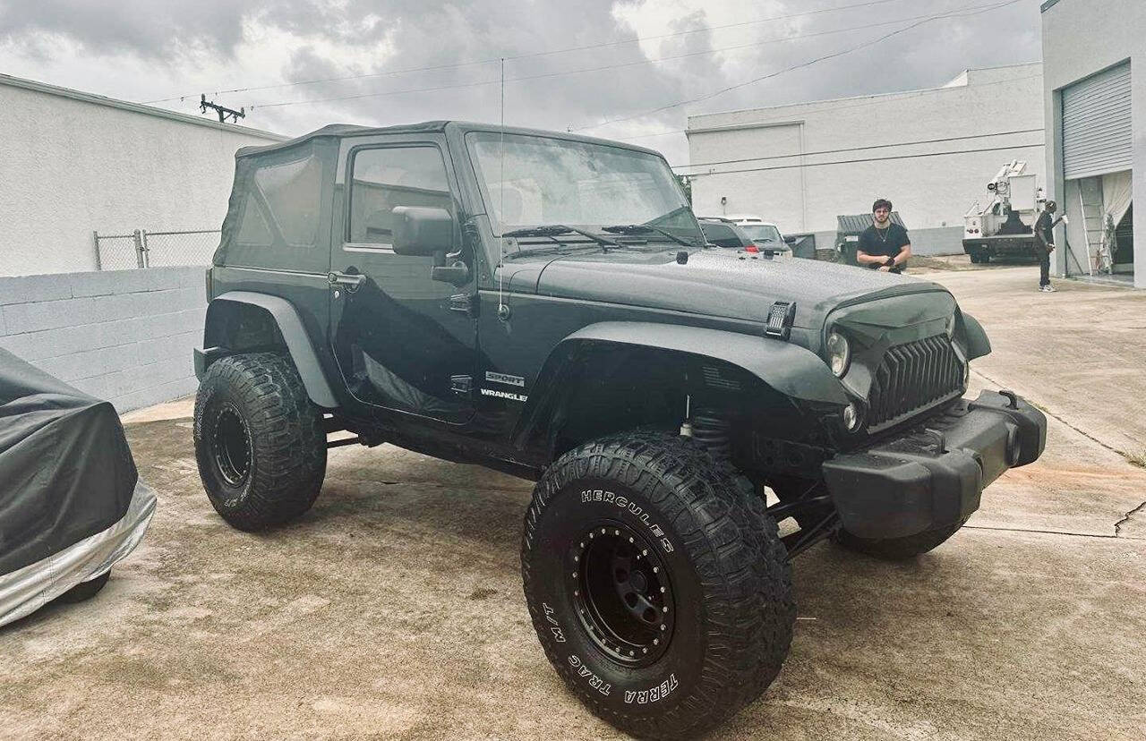 2014 Jeep Wrangler for sale at Salem Auto, INC. in Lake Park, FL