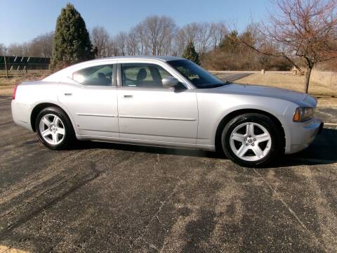 2010 Dodge Charger for sale at Crossroads Used Cars Inc. in Tremont IL
