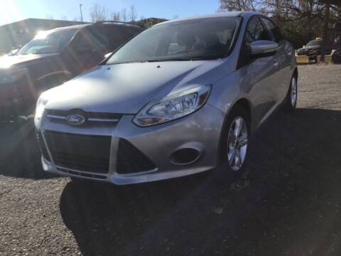 2013 Ford Focus for sale at Sparkle Auto Sales in Maplewood MN