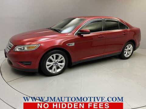 2012 Ford Taurus for sale at J & M Automotive in Naugatuck CT
