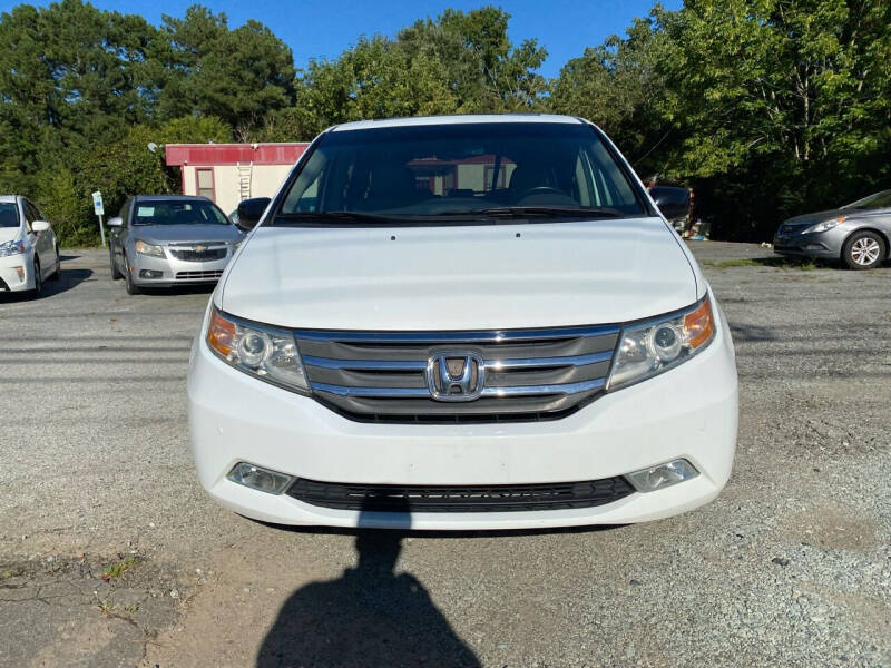 2011 Honda Odyssey for sale at REDLINE AUTO SALES in Durham NC