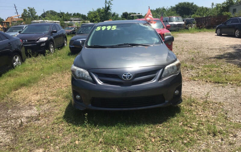 2011 Toyota Corolla for sale at COUNTRY MOTORS in Houston TX