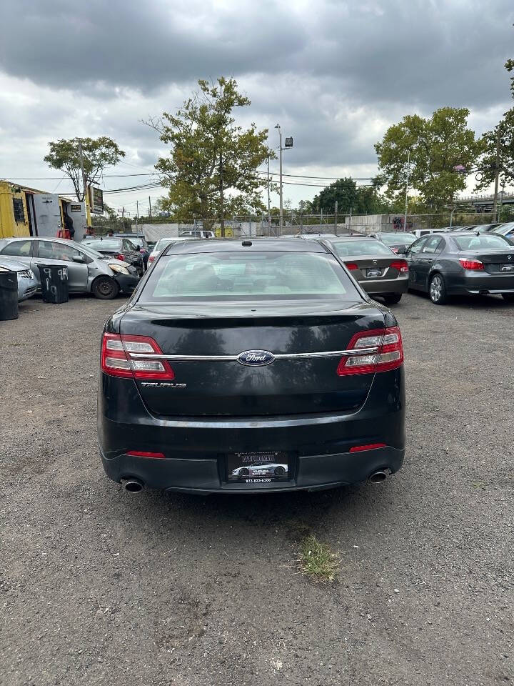 2013 Ford Taurus for sale at 77 Auto Mall in Newark, NJ