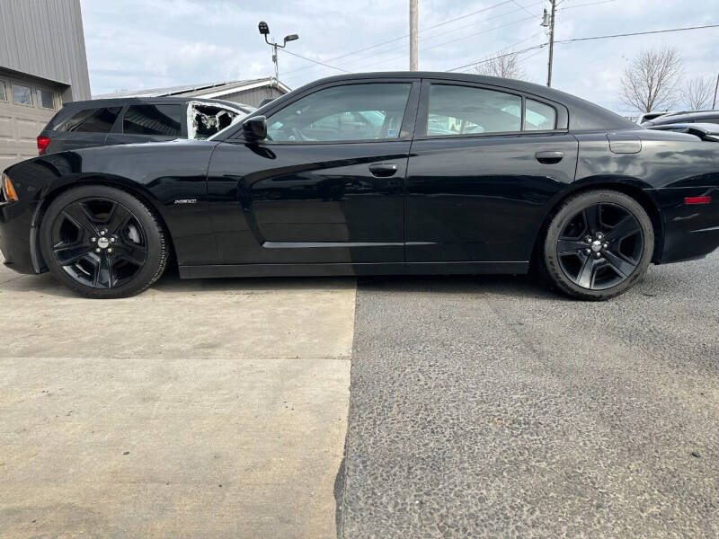 2011 Dodge Charger for sale at SMITH FAMILY CAR STORE INC in Roaring Spring PA