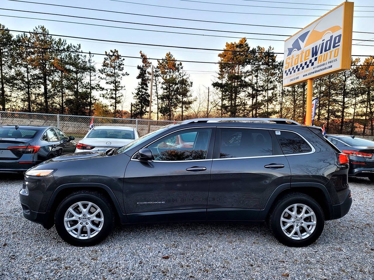 2015 Jeep Cherokee for sale at Statewide Auto LLC in Akron, OH