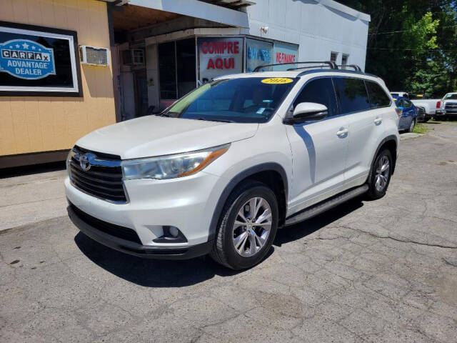 2015 Toyota Highlander for sale at DAGO'S AUTO SALES LLC in Dalton, GA