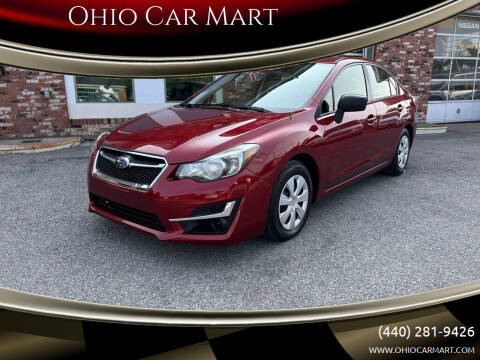 2015 Subaru Impreza for sale at Ohio Car Mart in Elyria OH