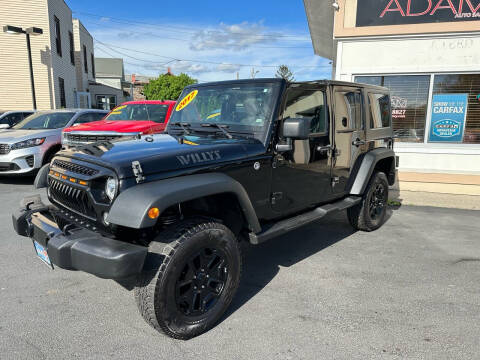 2017 Jeep Wrangler Unlimited for sale at ADAM AUTO AGENCY in Rensselaer NY