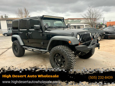 2012 Jeep Wrangler Unlimited for sale at High Desert Auto Wholesale in Albuquerque NM