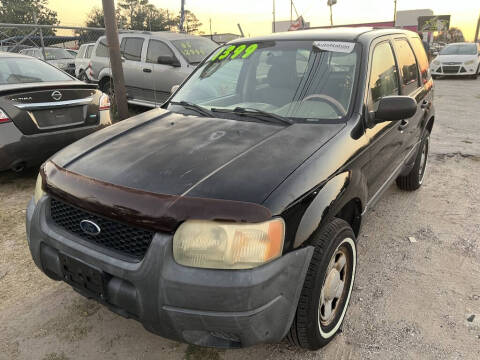 2004 Ford Escape for sale at SCOTT HARRISON MOTOR CO in Houston TX