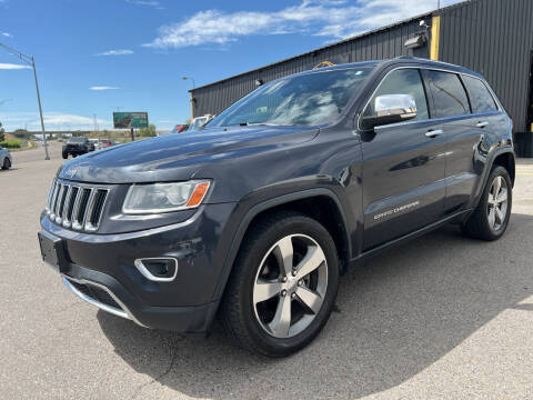 2014 Jeep Grand Cherokee for sale at BELOW BOOK AUTO SALES in Idaho Falls ID