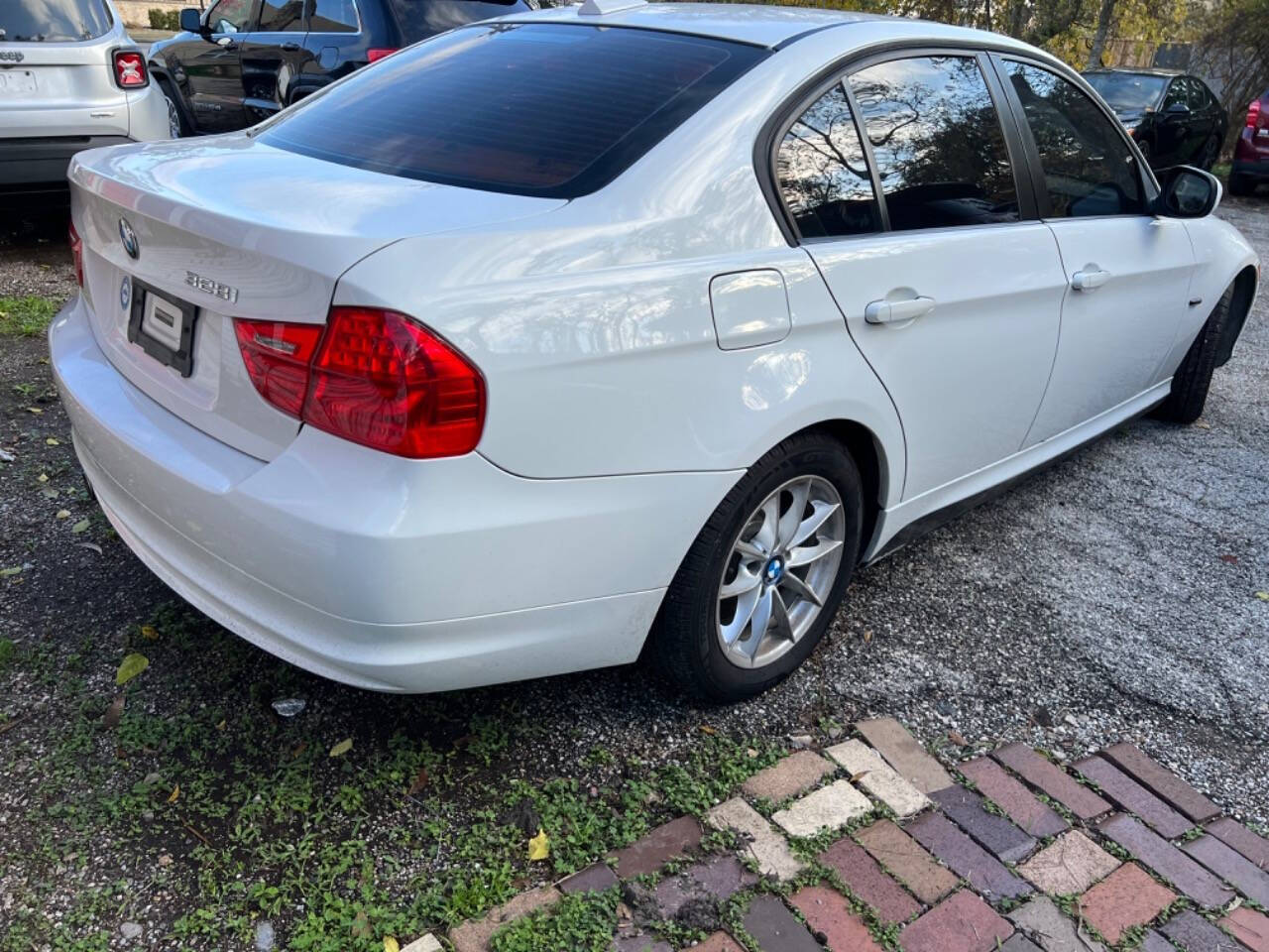 2010 BMW 3 Series for sale at J&J FLEET in Houston, TX