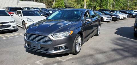 2015 Ford Fusion for sale at GEORGIA AUTO DEALER LLC in Buford GA