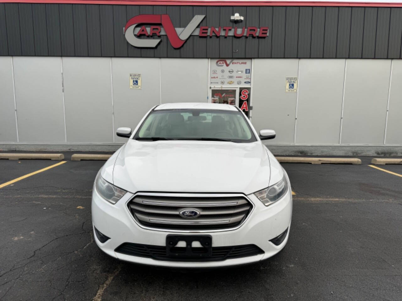 2014 Ford Taurus for sale at Carventure in Lansing, MI