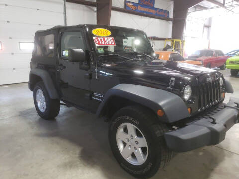 2012 Jeep Wrangler for sale at Hometown Automotive Service & Sales in Holliston MA