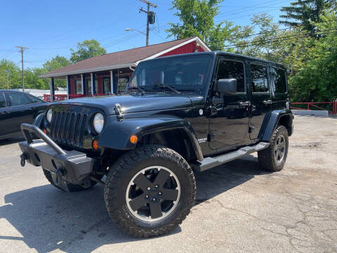 2012 Jeep Wrangler Unlimited for sale at Drive Wise Auto Finance Inc. in Wayne MI