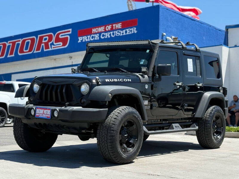 2014 Jeep Wrangler Unlimited for sale at Discount Motors in Pueblo CO