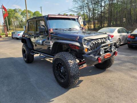 2007 Jeep Wrangler Unlimited for sale at GEORGIA AUTO DEALER LLC in Buford GA