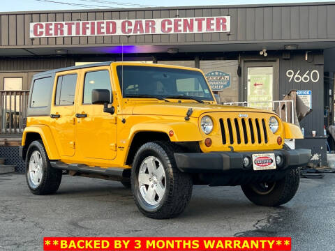 2011 Jeep Wrangler Unlimited for sale at CERTIFIED CAR CENTER in Fairfax VA