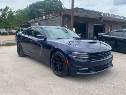 2015 Dodge Charger for sale at Texas Luxury Auto in Houston TX