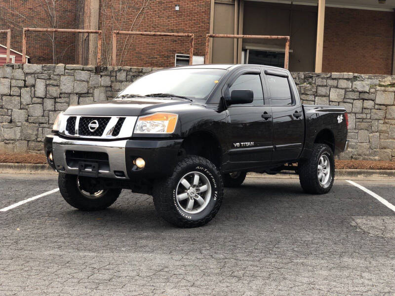 2011 Nissan Titan for sale at Santana Luxury Motors LLC in Mableton GA
