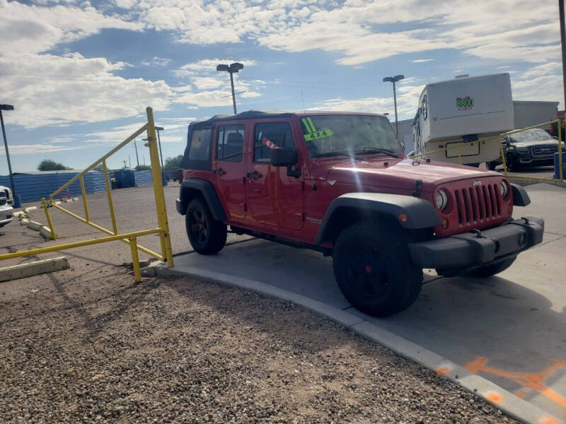 2011 Jeep Wrangler Unlimited for sale at CAMEL MOTORS in Tucson AZ