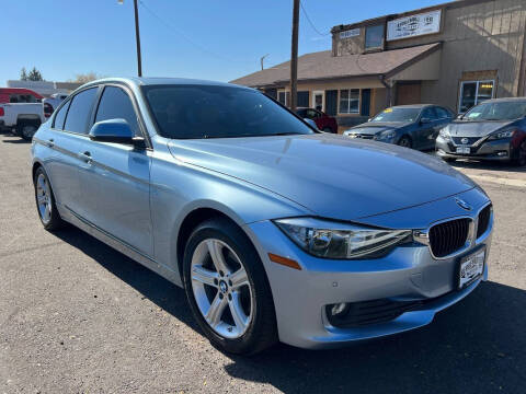 2014 BMW 3 Series for sale at BERKENKOTTER MOTORS in Brighton CO