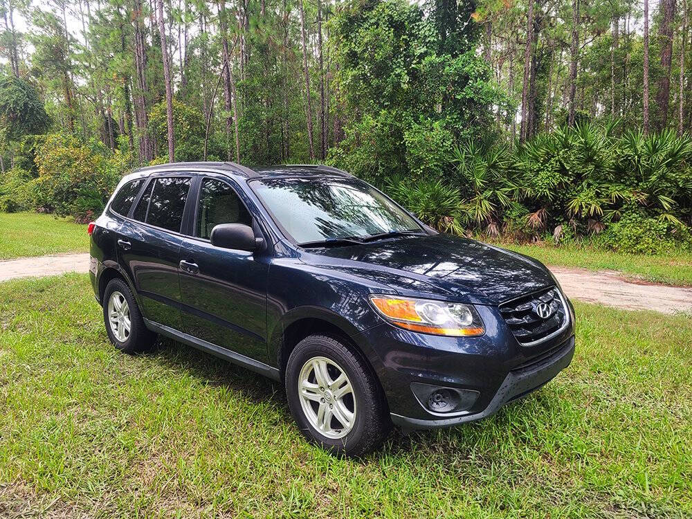 2011 Hyundai SANTA FE for sale at Flagler Auto Center in Bunnell, FL