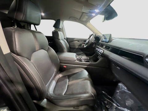 2023 Honda Pilot EX-L w/Rear Captain's Chairs