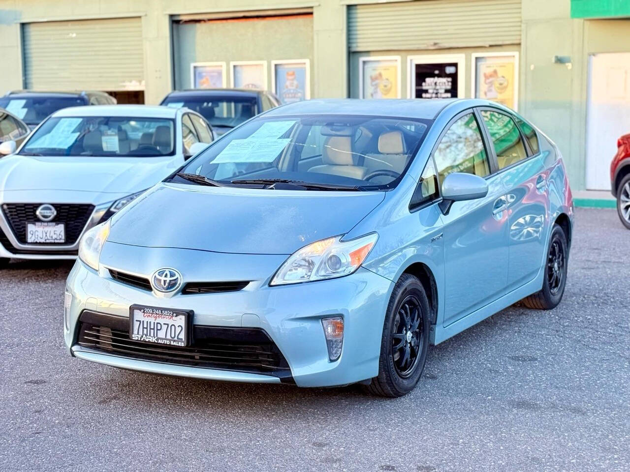 2014 Toyota Prius for sale at STARK AUTO SALES INC in Modesto, CA