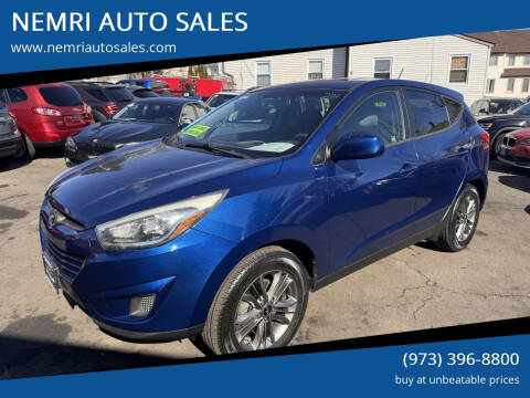 2014 Hyundai Tucson for sale at NEMRI AUTO SALES in Dover NJ