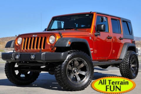 2011 Jeep Wrangler Unlimited for sale at Kustom Carz in Pacoima CA