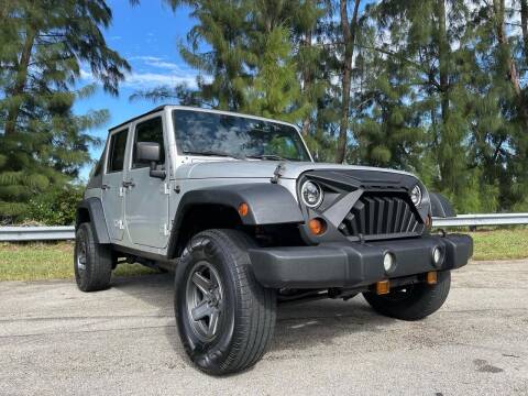 2012 Jeep Wrangler Unlimited for sale at Boss Automotive LLC in Davie FL