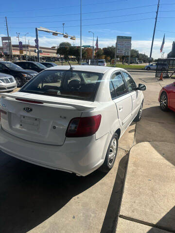 2011 Kia Rio for sale at Buy-Fast Autos in Houston TX